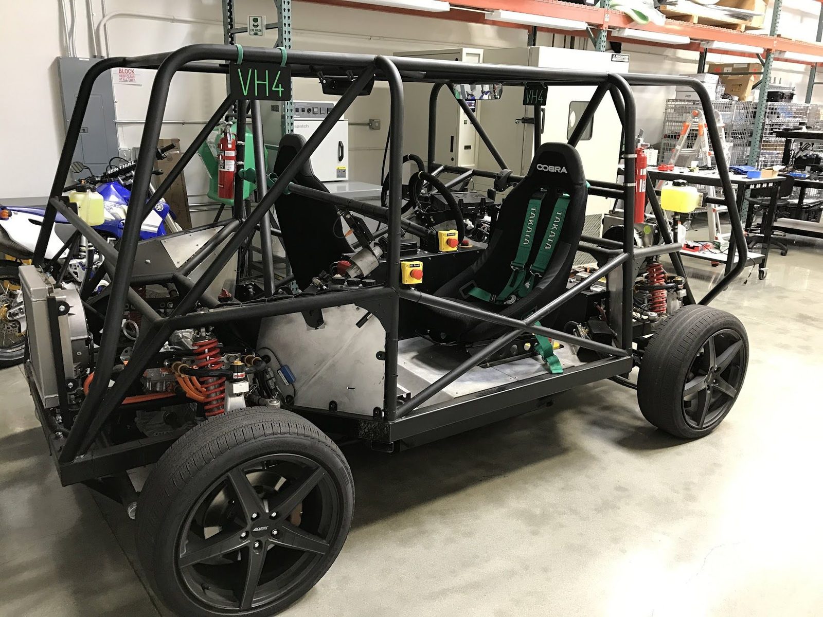 Autonomous vehicle chassis mule in a workshop
