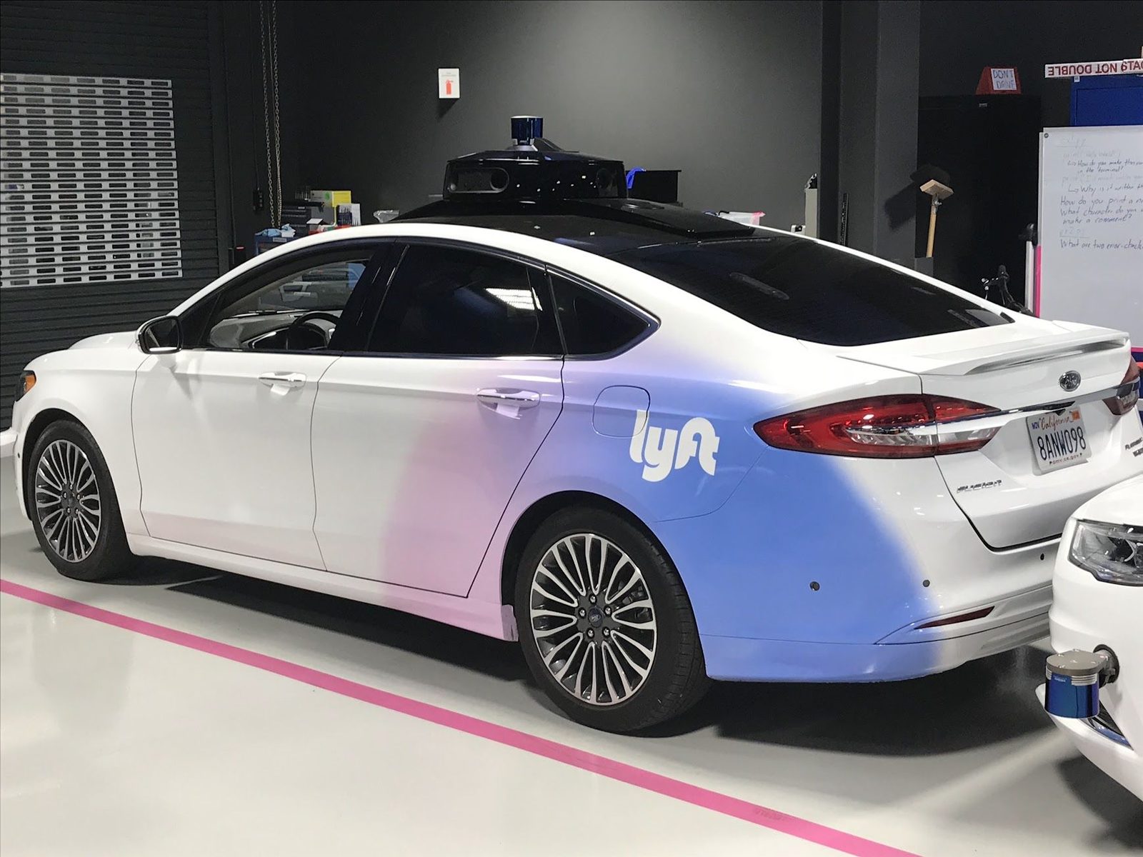SUV with roof-mounted autonomy sensor suite
